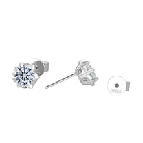 Silver stud earrings with a clear gemstone on a white background