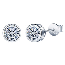 Silver stud earrings with clear gemstones on a white background