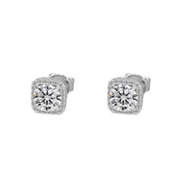 Pair of diamond stud earrings on a white background