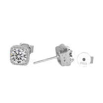 Silver stud earrings with clear gemstones on a white background